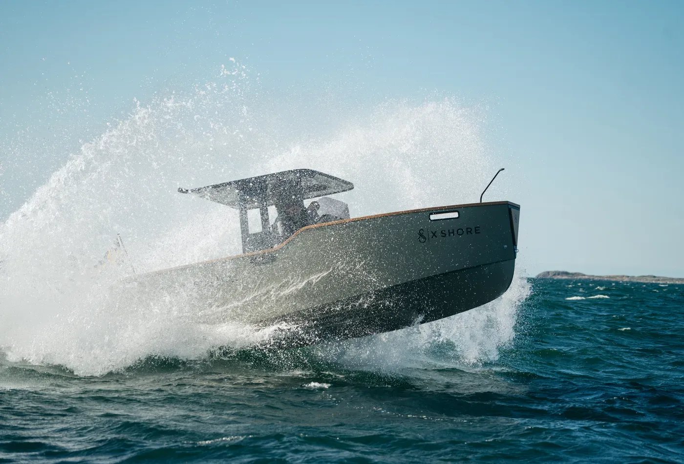 X Shore Eelex 8000 electric boat riding through waves at high speed