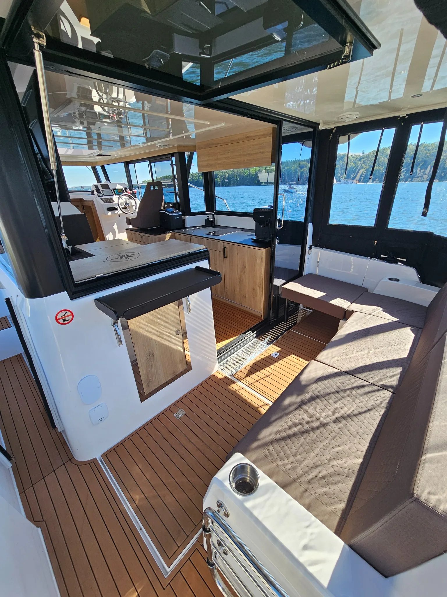 View from the aft cockpit into the saloon and galley of the Lamdo eLY30+.