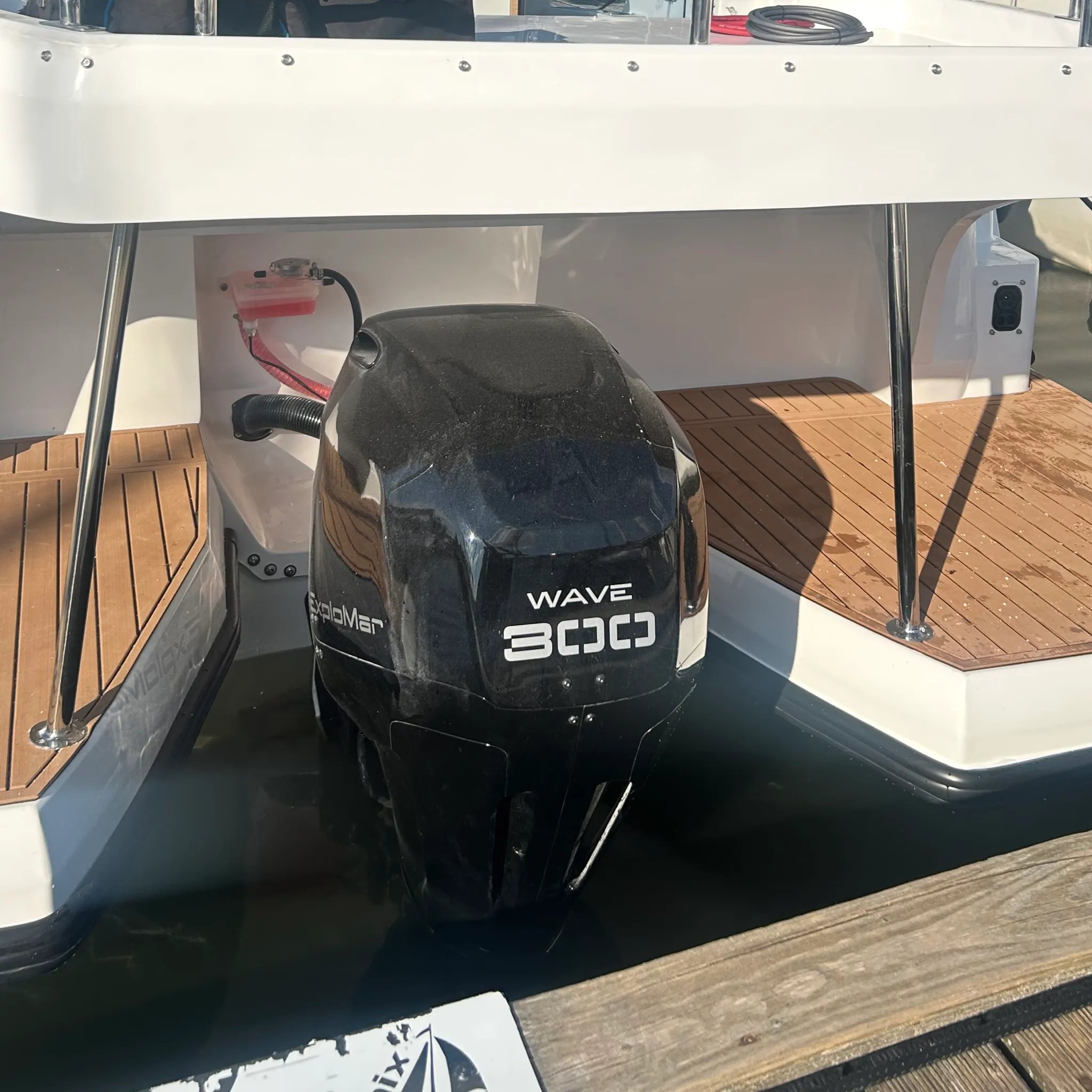 Close-up of the WAVE 300 electric outboard motor fitted to the Lamdo eLY30+.