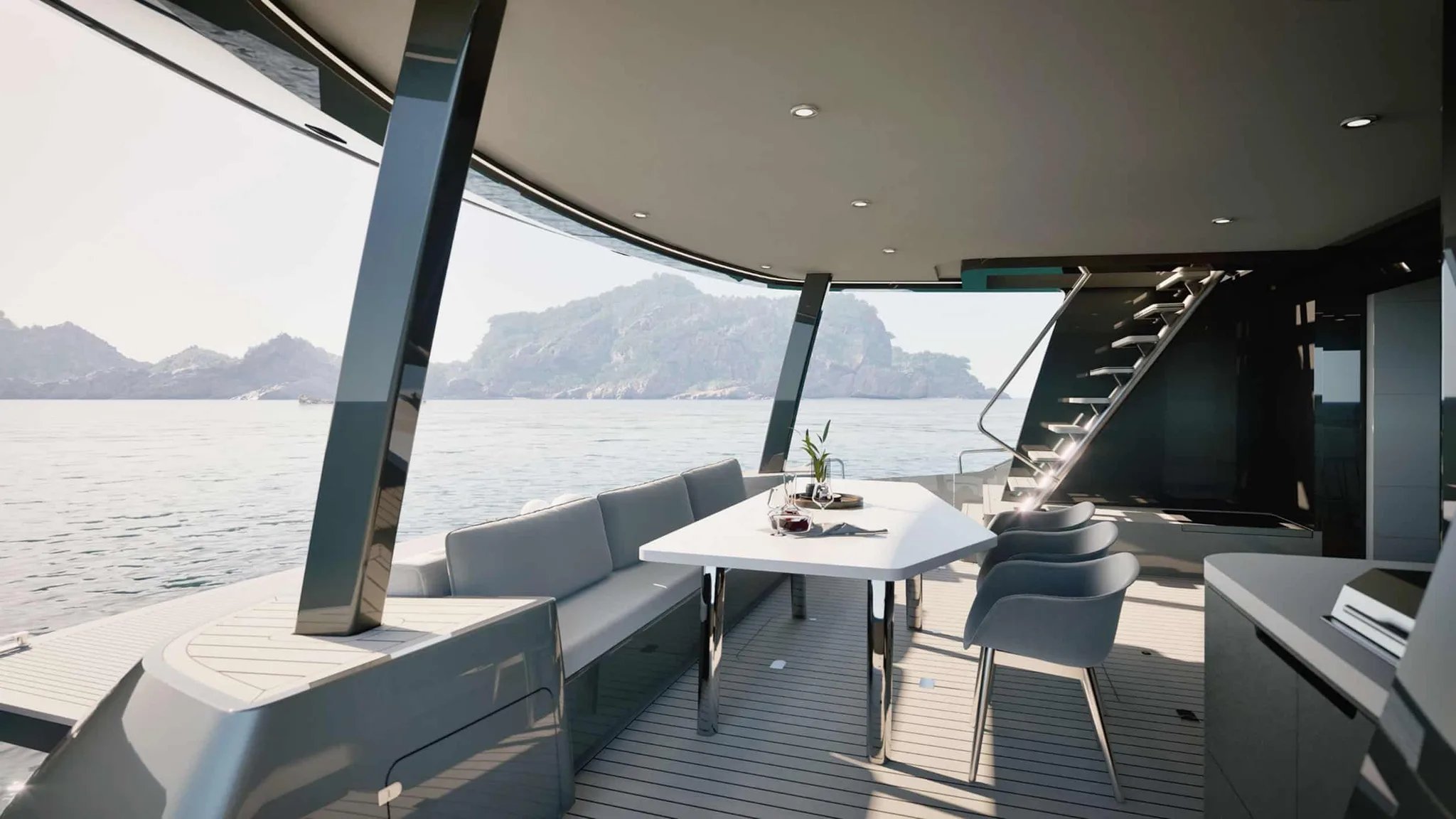 Un gran barco con una mesa blanca y sillas en la cubierta.