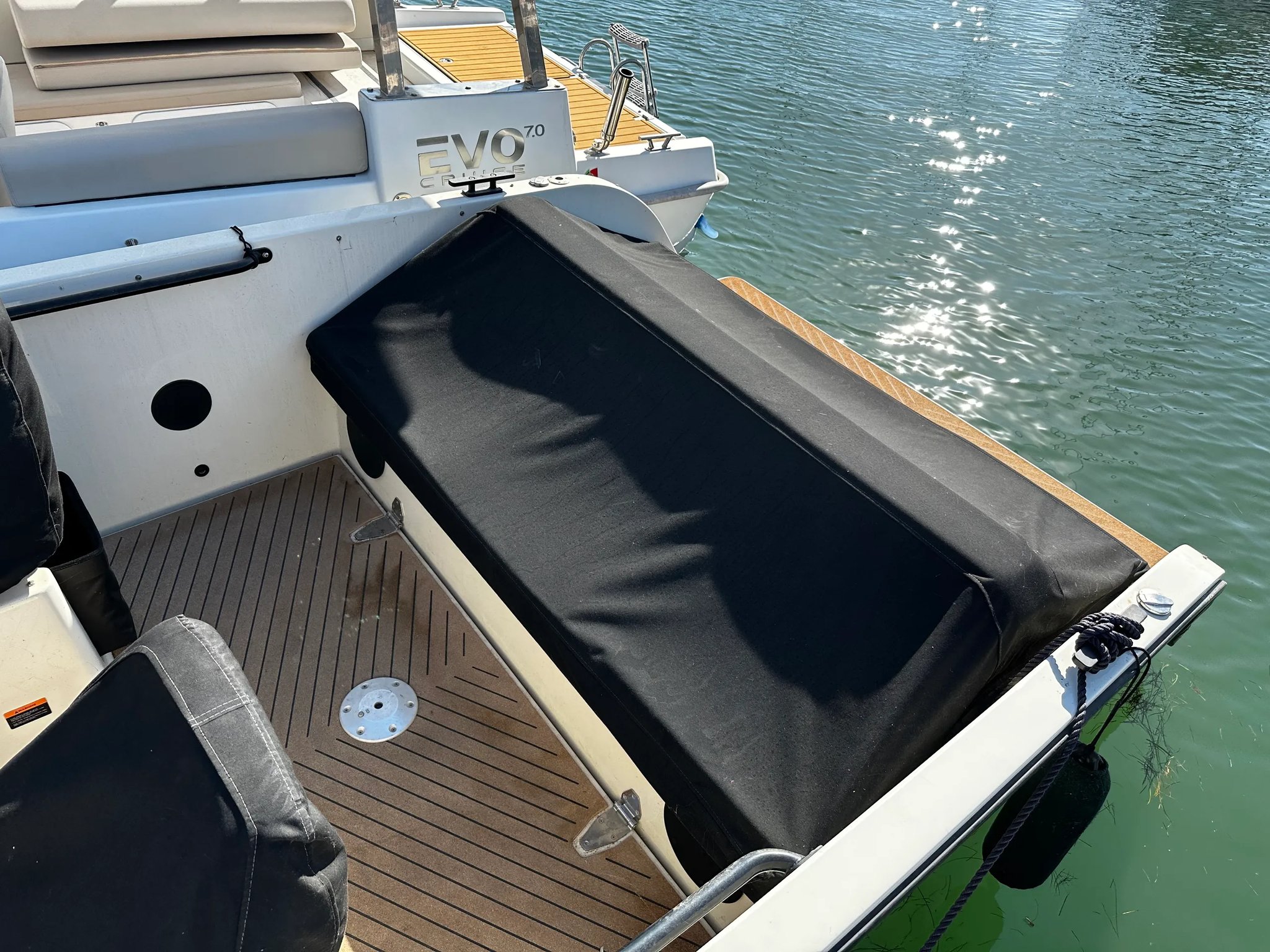 X Shore 1 Open Performance aft sunbed cover and swim platform detail