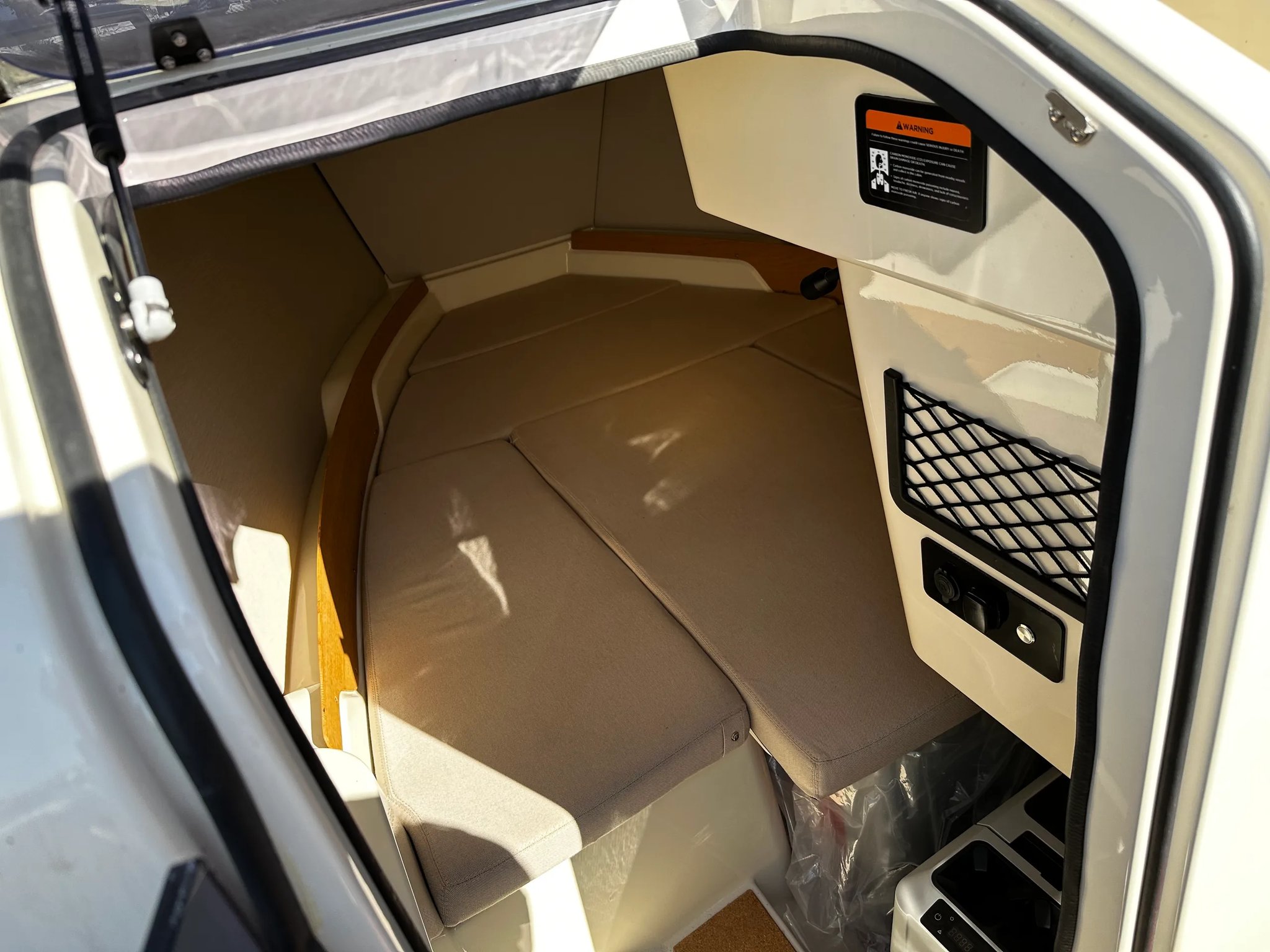X Shore 1 Open Performance bow cabin with berth and interior storage