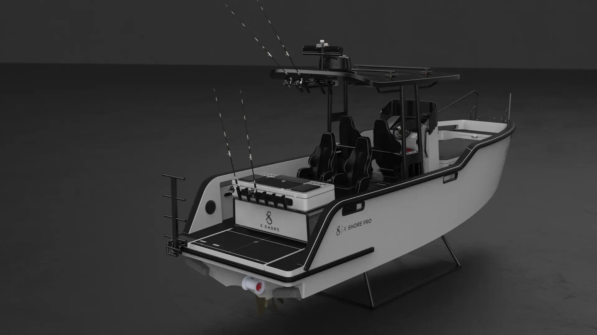 Rear three-quarter view of the X Shore PRO Fishing Edition with rod holders, T-top and open deck