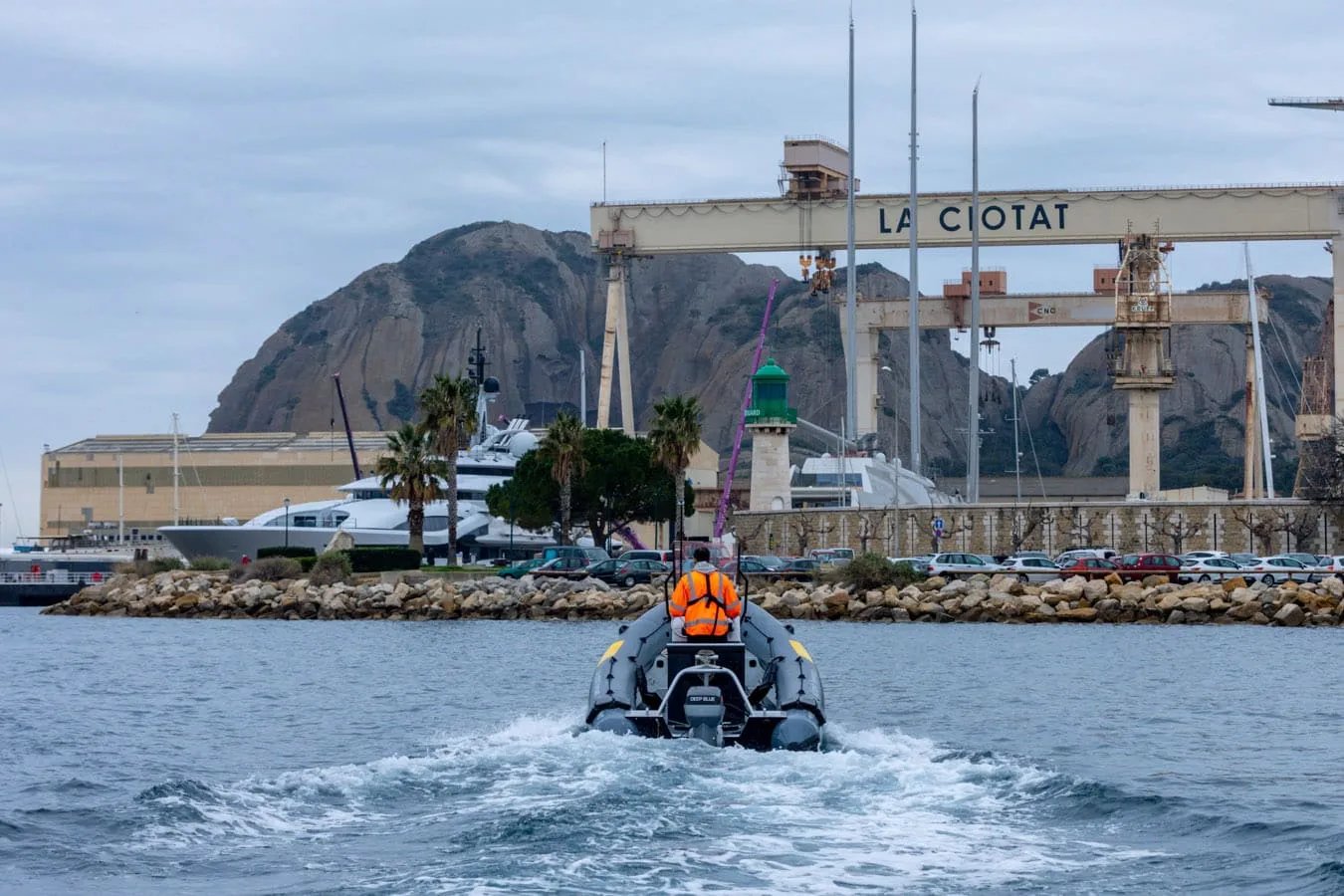 ZenPro 580 electric RIB rear view navigating in La Ciotat harbour
