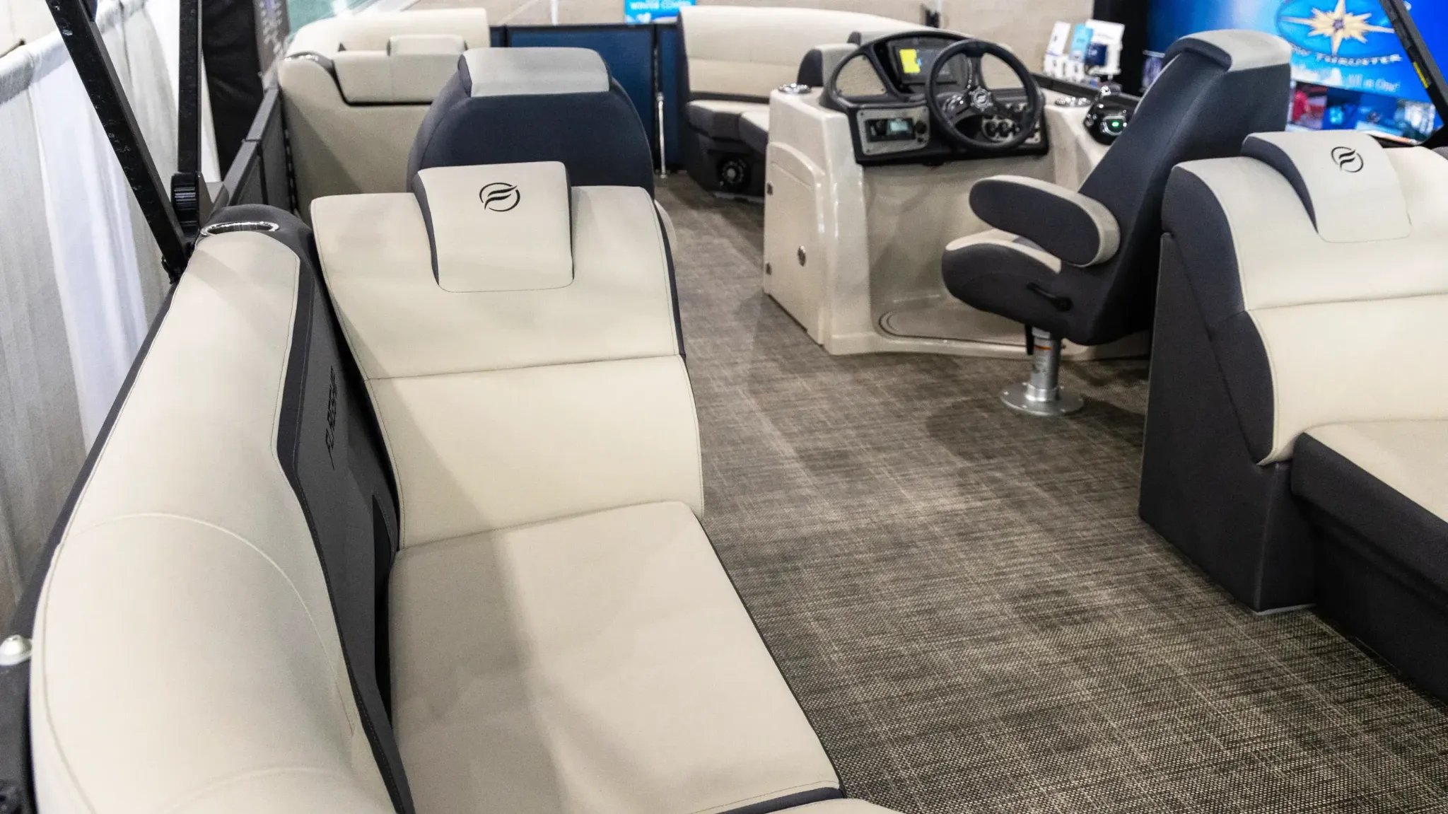 A boat with a white seat and a black seat.