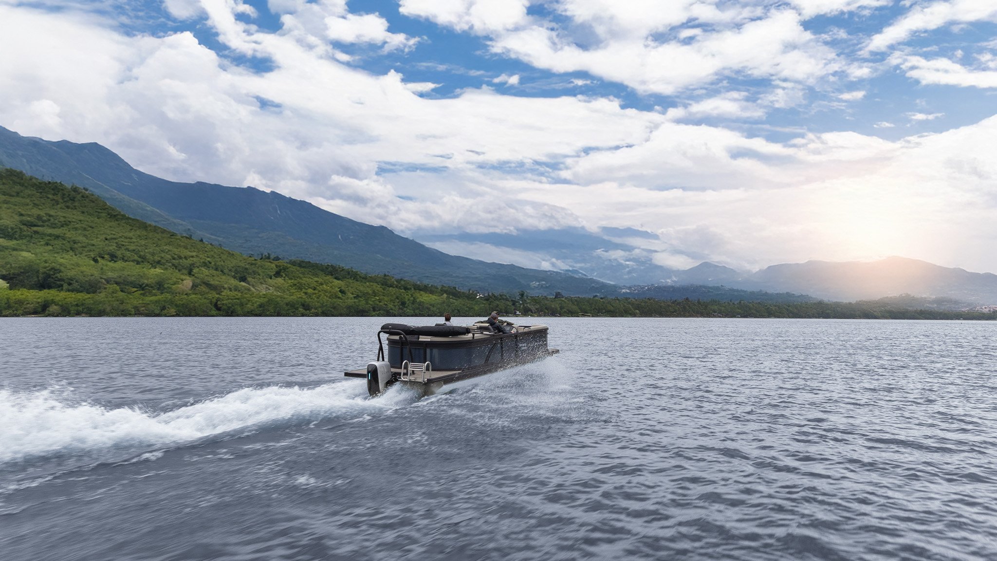A boat on the water with a man on it.